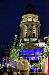 Lit-up tower of the Französischer Dom